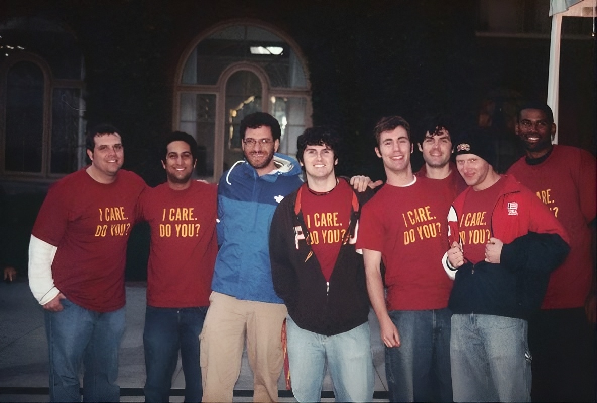 Todd Henneman with the original USC Men CARE cohort in matching program shirts